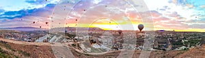 Panoramic view of the Hot Air balloons flying tour over Mountains landscape spring sunrice Cappadocia