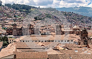 Panoramic view at the houses and Cathedra on Plaza de Armas in Cusco, Peru photo