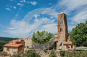 Panoramic view of houses, church and belfry in Moustiers-Sainte-Marie.