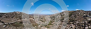 Panoramic view of huge rock, plateau, valley, Volax Tinos island Cyclades Greece. Banner