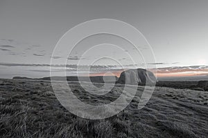 A panoramic view of the iconic scotty rock at sunset, illuminated