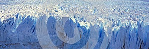 Panoramic view of icy formations of Perito Moreno Glacier at Canal de Tempanos in Parque Nacional Las Glaciares near El Calafate, photo