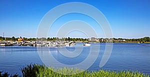 Panoramic view on idyllic dutch lake with vacation resort and yacht marina harbor- Leukermeer, Limburg, Netherlands