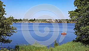 Panoramic view on idyllic dutch lake with vacation resort and yacht marina harbor- Leukermeer, Limburg, Netherlands