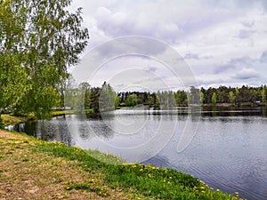 Panoramic view of idyllic summer landscape with lake