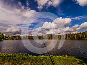 Panoramic view of idyllic summer landscape with lake