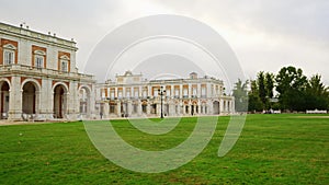 Panoramic view of the impressive royal palace of Aranjuez on its side facade, Madrid, Spain.