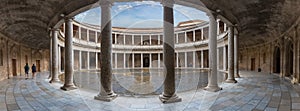 Panoramic view at the interior circular Patio on Charles V Palace, Renaissance building located on Assabica hill, tourist people photo