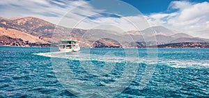 Panoramic view of Ionian island - Cephalonia. Ferry ship from Lixouri to capital of island - Argostolion. Beautiful spring