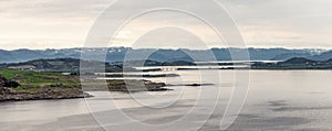 A panoramic view of islands, bridge and mountain range from Fjoloy fortress