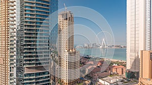 Panoramic view of JBR area and the famous Ferris Wheel aerial morning timelapse