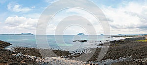 Panoramic view of Jongdal-ri beach and Seongsan Ilchulbong Tuff Cone in Jeju Island, Korea