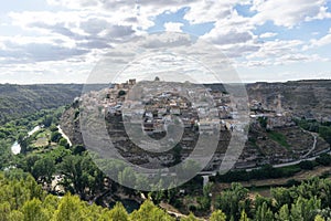 Panoramic view of Jorquera the small medieval village in a meander of the river Jucar. Albacete.