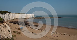 Panoramic view of Kingsgate Bay, Broadstairs, Kent UK. The sandy beach is surrounded by limestone cliffs.