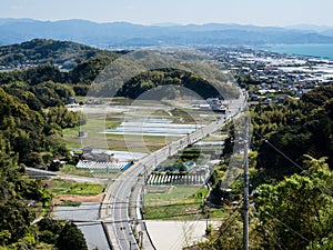 Panoramic view of Kochi city suburbs from Zenjibuji, temple number 32 of Shikoku pilgrimage