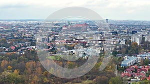 Panoramic View of Krakow Skyline in Autumn, Expansive view over the colorful autumn canopy of Krakow, highlighting
