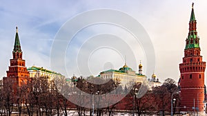 Kremlin`s surrounding red walls with Borovitskaya and Vodovzvodnaya Towers, Moscow photo
