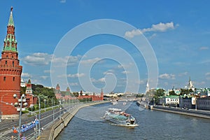 Panoramic view of the Kremlin wall and Moskva River with boat Moscow Moscu Russia Rusia summer sunny day