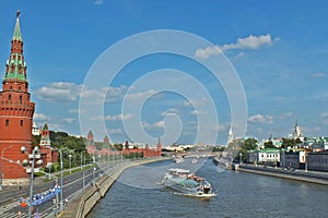 Panoramic view of the Kremlin wall and Moskva River with boat Moscow Moscu Russia Rusia summer sunny day photo