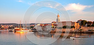 Panoramic view of Krk port and city walls from the sea - Croatia photo