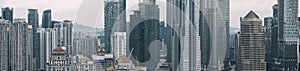 Panoramic view of Kuala Lumpur skyline with Petronas Twin Towers and other corporate buildings