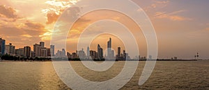 Panoramic View of Kuwait city Skyline from the Arabian Gulf Sea at Sunset