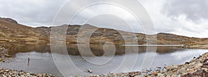 Panoramic view of a lagoon, located high in the Peruvian highlands at Shupluy, Ancash - Peru