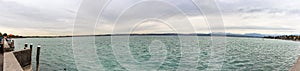 Panoramic  view of Lake Garda from the promenade of the Sirmione town in Lombardy, northern Italy