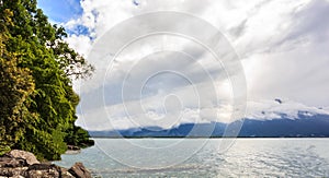 Panoramic view of Lake Geneva, one of Switzerland`s most cruised lakes in Europe, with sky full of clouds after the rain