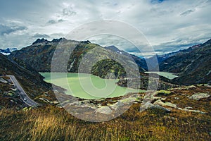 Panoramic view of the lake Grimselsee in Switzerland .