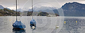 Panoramic view of the lake Lucerne on a cloudy spring day. Town of Luzern, Switzerland.