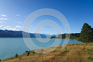 Panoramic view of Lake Pukaki, New Zealand, the turquoise water comes from Mt. Cook and Tasman glacier, South Island
