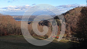 A panoramic view of the landscape. View of grassland, forest, mountain.