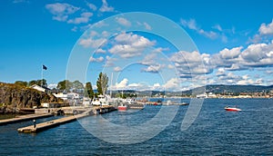 Panoramic view of Lindoya island on Oslofjord harbor near Oslo, Norway, with Lindoya Ost marina and summer cabin houses at