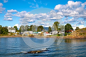 Panoramic view of Lindoya island on Oslofjord harbor near Oslo, Norway, with Lindoya Ost marina and summer cabin houses at photo
