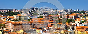 Panoramic view of Lisbon cityscape, budlings with red roofs in Portugal