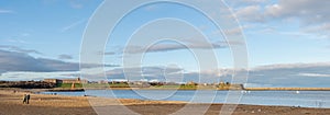 Panoramic view of Little Haven Beach in South Shields, UK, looking towards Tynemouth over River Tyne