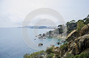 Panoramic view of Lloret de Mar Castle at sunset, Costa Brava between Barcelona and Girona, Spain. Ancient Fortress in photo