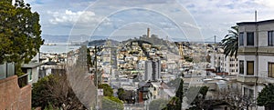 Panoramic view of Lombard Street which is a street in San Francisco, California, United States. Steep street with many slopes.