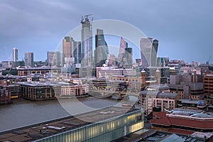 Panoramic view of London skyscrapers in the financial district in the evening, after sunset