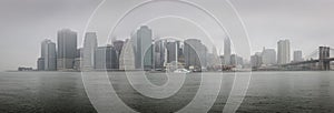 Panoramic view of Lower Manhattan on a foggy morning - NYC