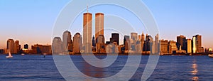 Panoramic view of lower Manhattan and Hudson River, New York City skyline, NY with World Trade Towers at sunset