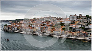 Panoramic view from Luis bridge in Porto to the town