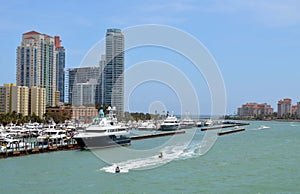 Panoramic View of Luxury Condo Towers overlooking a marina