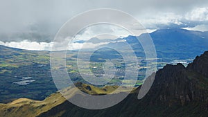 Panoramic view of Machachi village from the summit of the Ruminahui volcano on a cloudy day photo