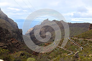 Panoramic view of the Macizo de Teno mountains with curvy roads leading to Masca village in Tenerife