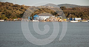 Panoramic view of marina di Olbia port and yacht marina at sunset