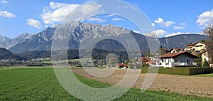 Panoramic view of the market town of Wattens against the Karwendel mountains. Wattens, state of Tyrol, Austria