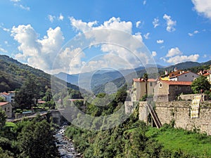 Panoramic view of the medieval fortified town Prats de Mollo la Preste, Tech river and mountains, Pyrenees Orientales, southern