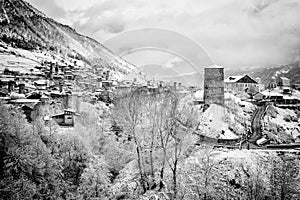 Panoramic view on Medieval towers in Mestia in the Caucasus Mountains, Upper Svaneti, Georgia. Black and white
